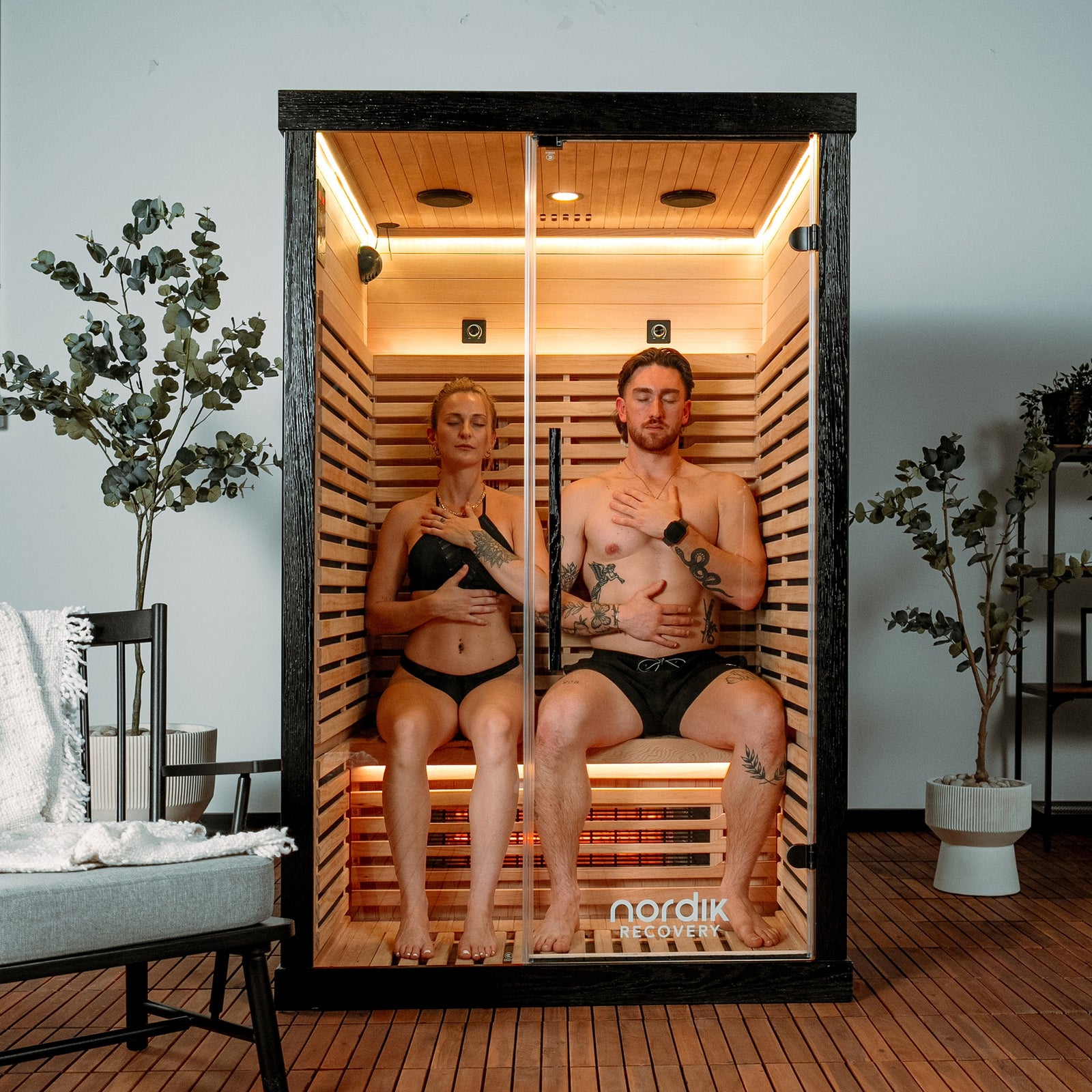 Full spectrum infrared sauna interior with carbon and ceramic heater panels